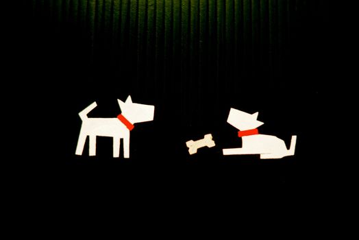 dog character on black scene that made from paper cutting handcraft ,shallow focus