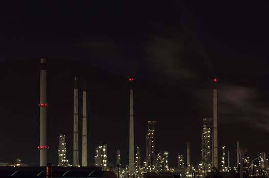 Oil refinery plant at dusk, power station