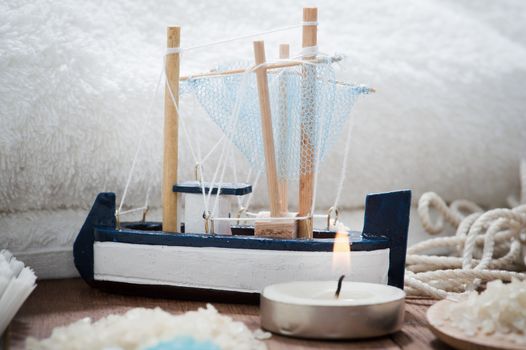Bathroom Spa Set on wooden table with salt and candle 