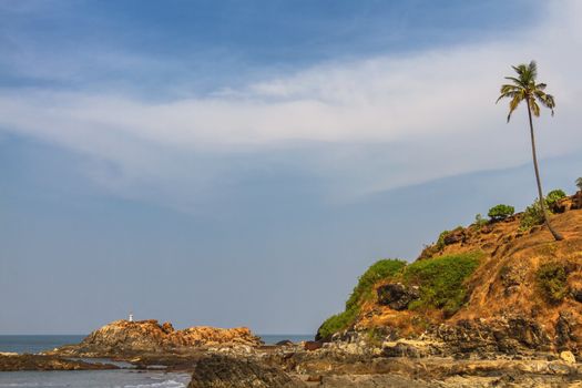 View from beach in Goa to Arabian sea. Rock near sea