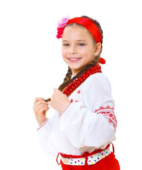 A little girl in Ukrainian national dress on the white background