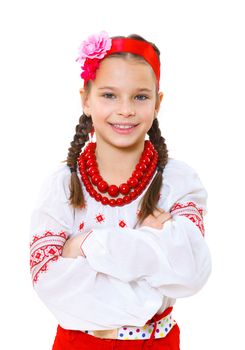 A little girl in Ukrainian national dress on the white background