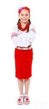 A little girl in Ukrainian national dress on the white background