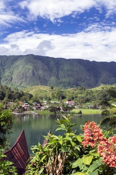 View from Tuk-Tuk Village to Samosir. Lake Toba, North Sumatra, Indonesia.