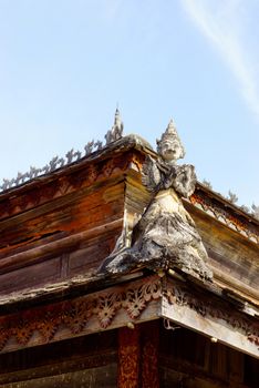 burmese traditional angel sculpture standing to protected pagoda,Lampang temple,Thailand