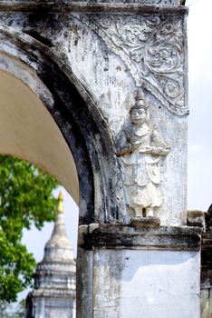 burmese traditional angel sculpture standing to protected pagoda,Lampang,Thailand