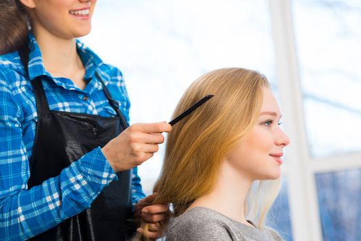 young attractive woman hairdresser hairstyle customer picks