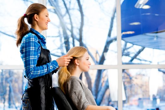 young attractive woman hairdresser hairstyle customer picks