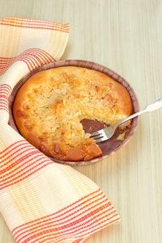 Apple Pie on a Brown Rustic Wooden Background with Fork