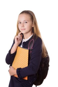 Serious schoolgirl in uniform and with bag over white