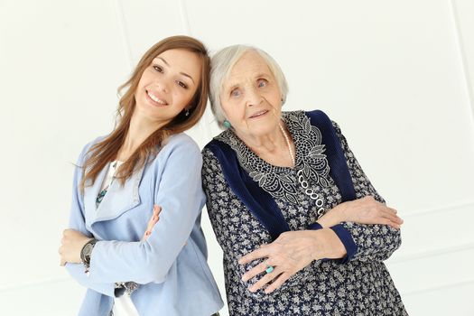 Elderly woman and beautiful granddaughter