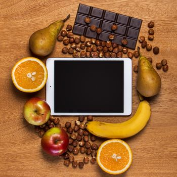 Kitchen. Tablet and food on the table