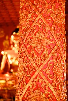 high complicated stucco work showing of traditional thai pattern that decorated with mirror and precious stone,Lampang temple,Thailand