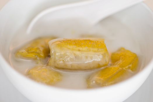 banana in coconut milk,Sweet yellow banana Topped with coconut milk is the famous dessert Thailand