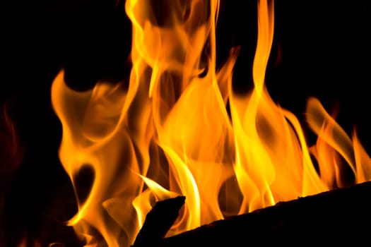 Photo with red flame on black background