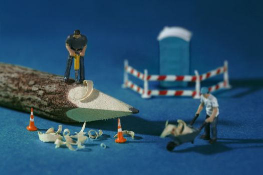 Miniature Construction Workers in Conceptual Imagery With Pencil