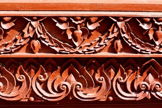 the detail of  handcraft wood carving for decorated temple,showing of thai pattern,Lampang temple,Thailand