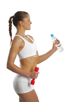 image of a young attractive sporty woman with red dumbbells and water bottle