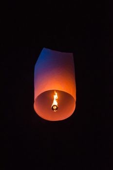 Single Floating Lantern during Loy Kratong Festival in Thailand