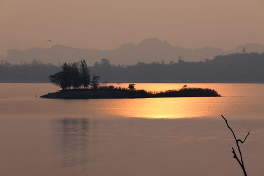 River with gold color reflect from sunlight