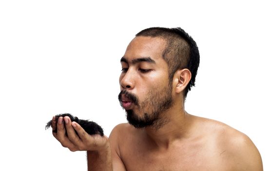 Asian man blowing his hair from haircuton white background.