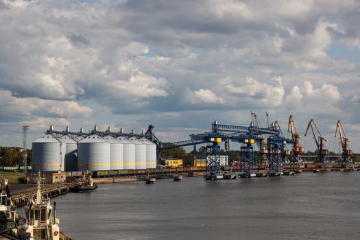 port grain terminals against cloudy sky