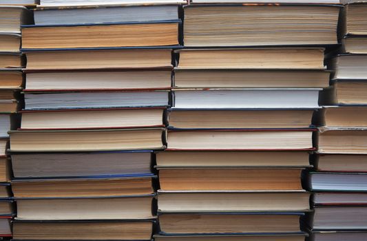 Many old books on the table. Close-up view