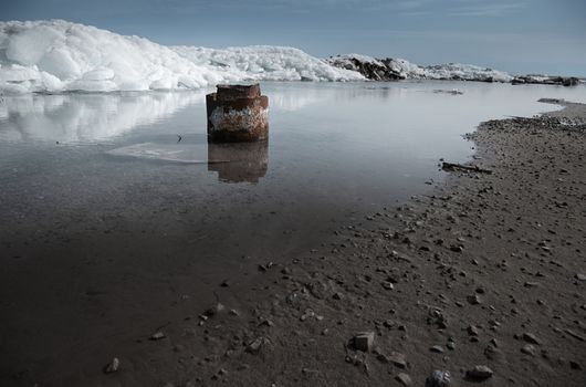 Abandoned rusty oil well at the northern location