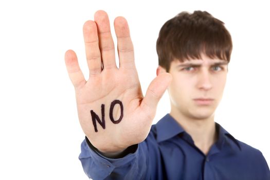 Serious Teenager shows the palm with an inscription NO