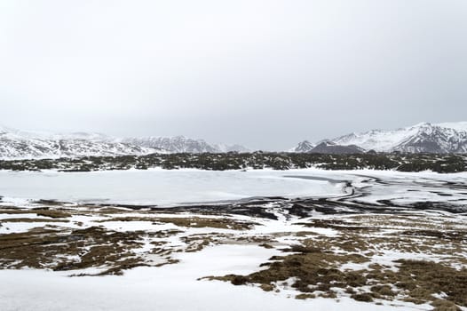 the iceland mountains and lake around snaefellsnes in winter