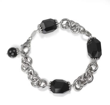 Onyx Black Bead Fine jewelry link chain bracelet isolated on a white background.