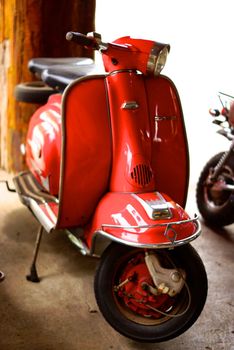 classic red lambretta scooter,shallow focus