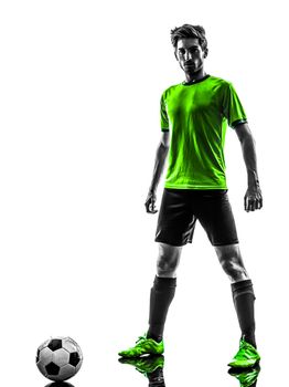 one soccer football player young man standing defiance in silhouette studio on white background