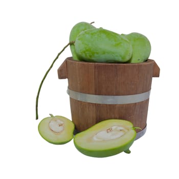 Green mango in bucket isolated