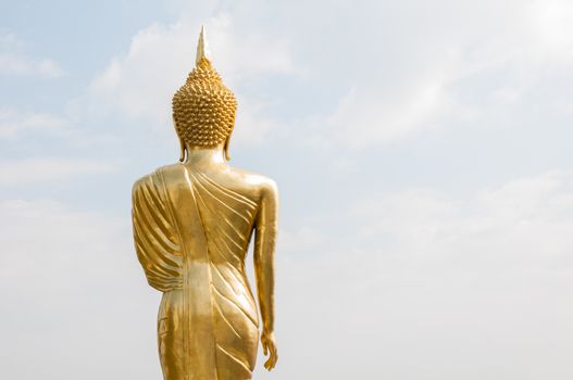Buddha standing on a mountain Wat Phra That Khao Noi, Nan Province, of Thailand