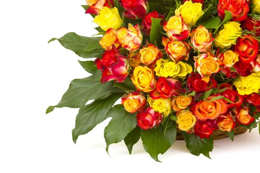 A bouquet of multicolored roses in a basket