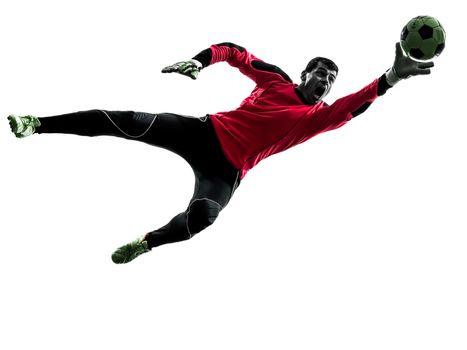 one  soccer player goalkeeper man catching ball in silhouette isolated white background