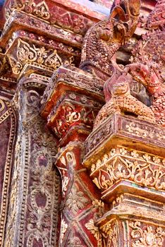 ancient complicated stucco work showing of traditional thai pattern that decorated with mirror and precious stone,Lampang temple,Thailand