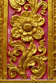 high complicated stucco work showing of traditional thai pattern that decorated with mirror and precious stone,Lampang temple,Thailand