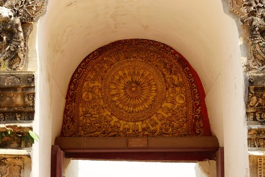 high complicated stucco work showing of traditional thai pattern that decorated with mirror and precious stone,Lampang temple,Thailand