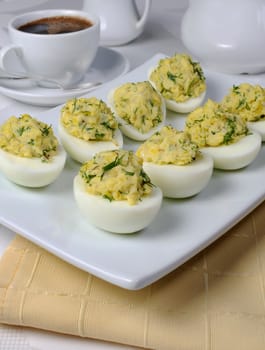 Eggs stuffed with roasted onions and herbs