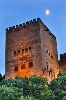 Alhambra Tower Moon from Walking Street Del Darro Albaicin Granada Andalusia Spain  