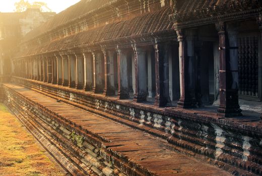 Long corridor of pillars in temple ruins, Angkor Wat, Cambodia