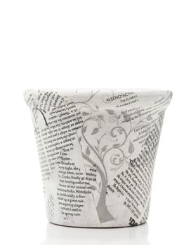 News paper decorated flower pot on white background