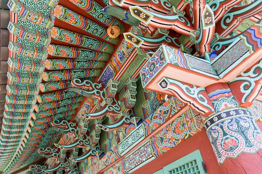 Colorful art of paintings on wood at a korean buddhist temple