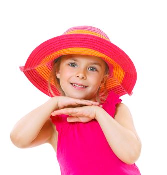 Cute little girl wearing a beach hat smiling isolated on a white background.