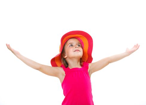 Cute little girl wearing a beach hat smiling isolated on a white background.