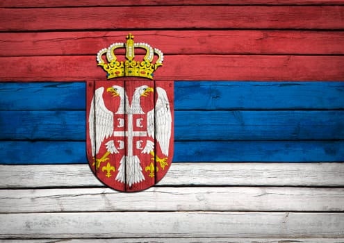 Serbia flag painted on wooden boards. Grunge style