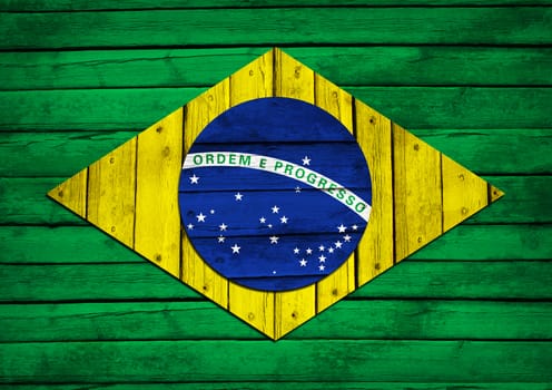 Brazilian flag painted on wooden boards. Grunge style