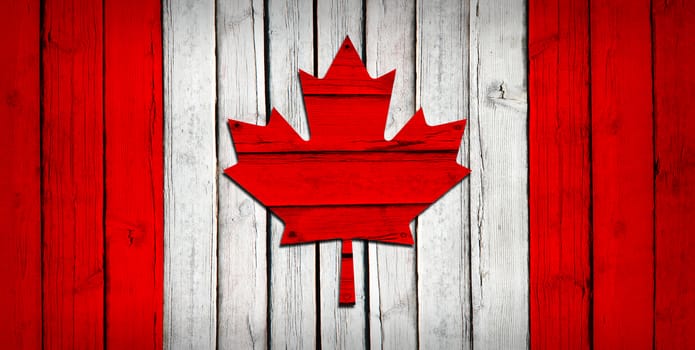Canadian flag painted on wooden boards. Grunge style